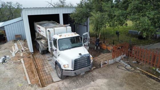 Volumetric concrete mixed on site for a garage pad